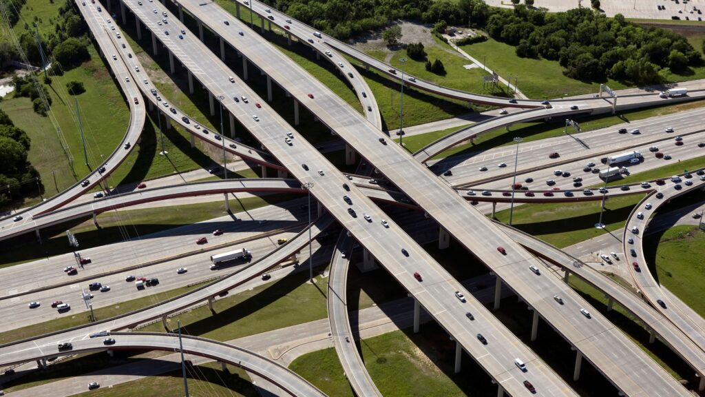 Aerial view of a complex highway interchange in Mississippi, illustrating common areas for car accidents in Gulfport, with multiple lanes and intricate connections, highlighting the need for heightened awareness and caution while driving